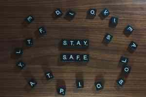 Scrabble tiles that say "stay safe."