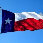 Texas flag, learn about the benefits of launching your startup in Texas.