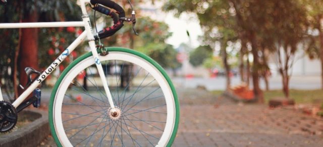 A bicycle in a park.